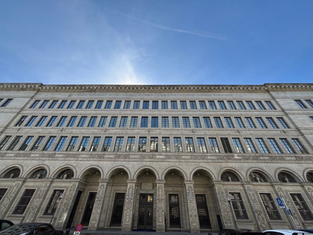Exterior facade of the Swiss National Bank building, representing secure Swiss bank accounts for non-residents.