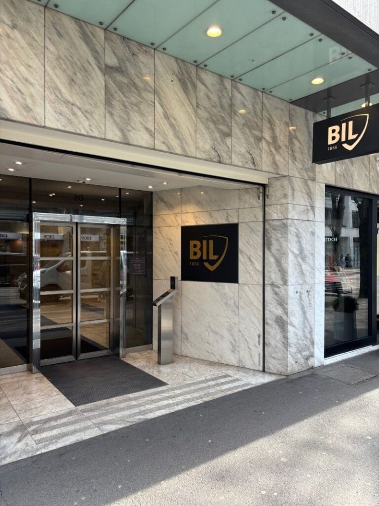 Marble entrance of an elite Swiss private bank, representing the exclusive tier of financial institutions available when you open a Swiss bank account as a high-net-worth non-resident.